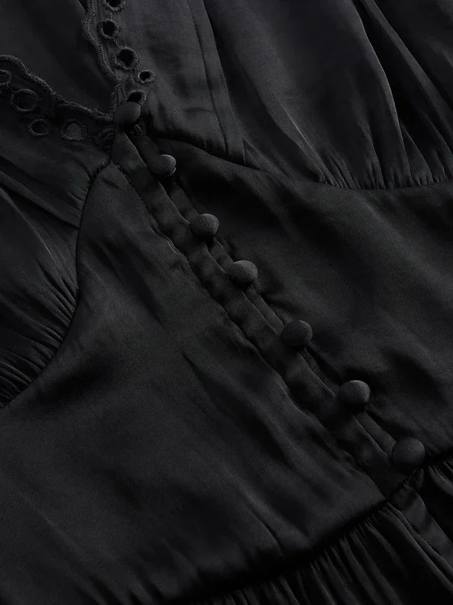 Eyelet V-Neck Peplum Top